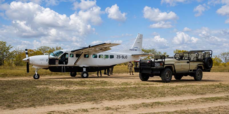 Fly-in safari aircraft landing near Serengeti safari camp